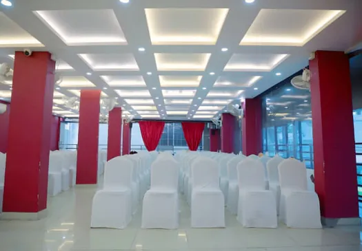 Hotel CAPS Events Hall with theatre-style seating facing the stage