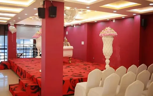 Hotel CAPS Events Hall stage and seating area