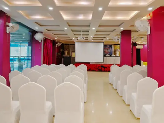 Hotel CAPS Events Hall with spacious seating and illuminated ceiling